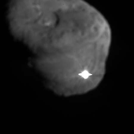 The moment of impact (4/7/2005) on comet Temple-1 p