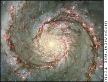New images from the Hubble Space Telescope reveal amazing details about one of the most spectacular galaxies - M51, also known as the Whirlpool Galaxy