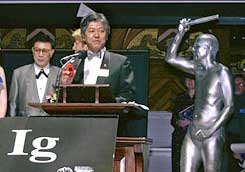 Photo: AP Award ceremony at Harvard University. Kaito Sata (center) also received an award for a device to translate dog barks