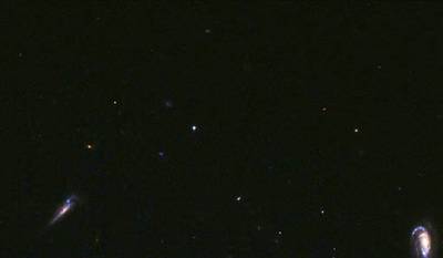 What remains after the explosion of GRB 030329 (red dot in the center of the image)