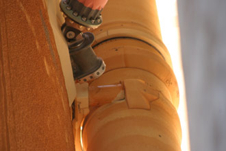 The area where the foam is torn catches the oxygen tube in the outer tank of the shuttle Discovery. this evening. Photo: NASA.