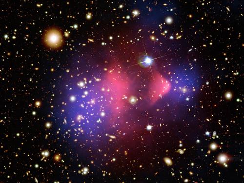 Bullet cluster - galaxies grow by merging and absorbing gas and dark matter from the space around them