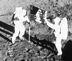 Armstrong and Aldario plant the American flag on the moon during the Apollo 11 flight, July 20-21, 1969