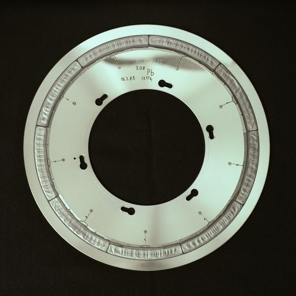 A lead plate that the researchers bombarded with zinc atoms, which fused into the 112th element