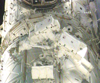 Shuttle heat tile sealing tests on STS-123's fourth spacewalk, March 2008