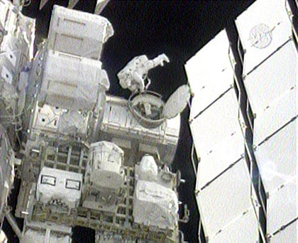 The astronauts exit the station's air terminal for the fifth and final spacewalk of mission STS-123