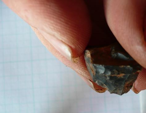 A tool made of flint that was exposed in the lower layer of the Wonderwork cave