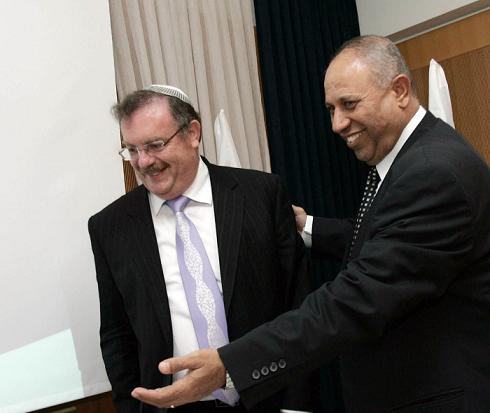 Outgoing minister Ralav Majdala and incoming minister Daniel Hershkovich at their exchange ceremony, April 1, 2009. Photo: Sasson Thiram