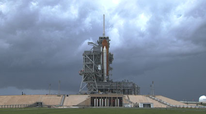 The shuttle Endeavor as photographed on Friday, July 10, 2009 under cloudy Florida skies. Later, the launch pad area was hit by 11 lightning bolts, but most of them were neutralized by the lightning rod