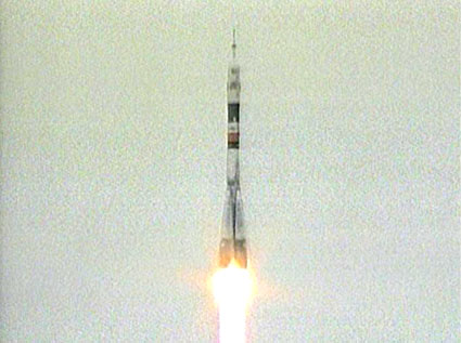 The rocket carrying the Soyuz TM-14 spacecraft takes off from Kazakhstan