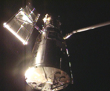 The Hubble Space Telescope as the Space Shuttle Atlantis approaches it, May 13, 2009