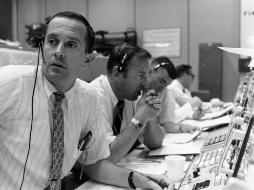 The tension of the control center personnel in the fateful minute before the landing, which almost happened in a rocky field