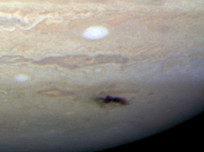 The new spot on Jupiter this week - as photographed by the Hubble Space Telescope (one of the first images from Planetary Camera 3 - the new camera). Jupiter and Saturn throw out or absorb the cometary shells from the Oort cloud