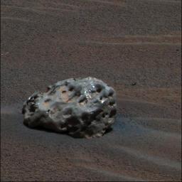 A stone discovered on Mars by the robotic vehicle Opportunity and which is suspected to be a meteorite