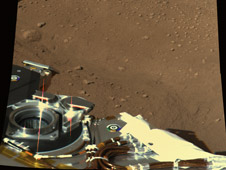 An almost real color photograph of the lander approach