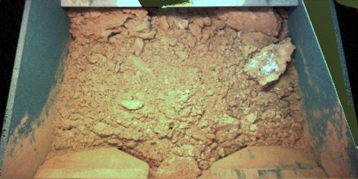 Martian soil inside the shovel of the Phoenix lander