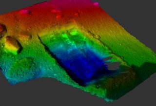 The area that Phoenix excavated and took the soil sample from