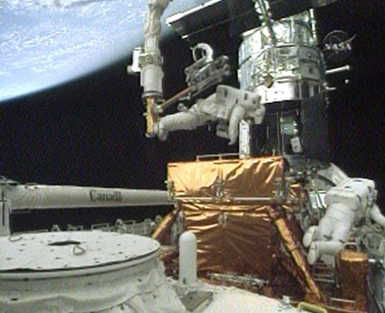 The fourth spacewalk to the cargo deck of Atlantis to upgrade the Hubble Space Telescope, May 17, 2009
