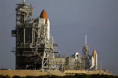Endeavor and Atlantis on two launch pads at the same time. A rare event and this time is also the last time