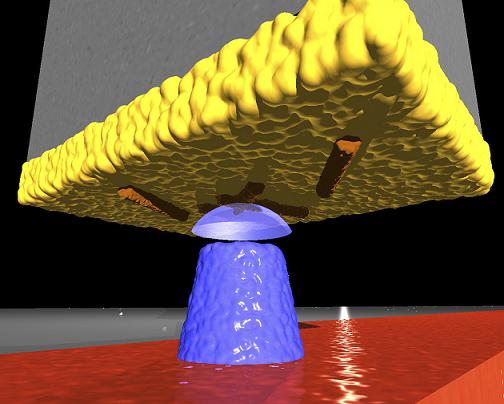 Demonstration of a magnetic coil in the new microscope that works to launch and receive the magnetic resonance returning from the body being examined. Here in the picture with the tested virus