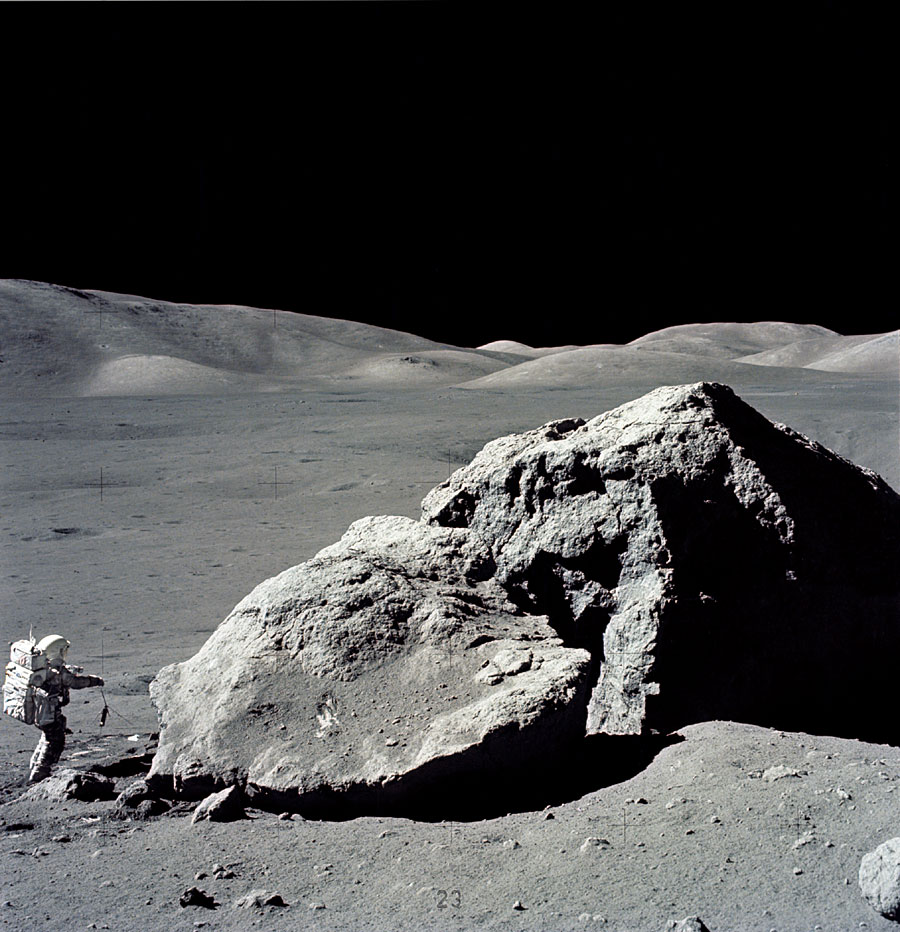 The only professional geologist to reach the moon, Harrison Schmidt in the Apollo 17 spacecraft (1972) examines a rock.