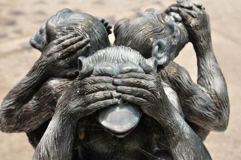The denial of evolution - the example of the statue of the three monkeys. Photo: shutterstock