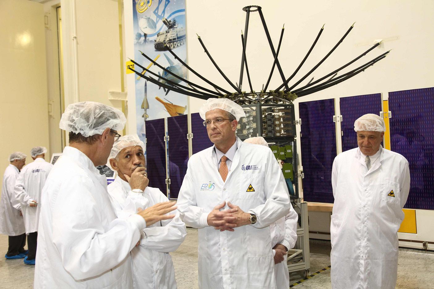 . NASA head Charles Bolden (second from the right) during his visit to the aerospace industry against the background of the "Texar" satellite, Yossi Weiss, VP of the TAA and director of the Missile and Space Department (third from the left) and Aryeh Halzband, director of the space plant (first from the left).