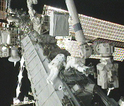 Doug Wilcock and Trace Caldwell-Dyson on the third spacewalk to repair the ammonia pump in the cooling system, 16/8/2010. Photo: NASA TV