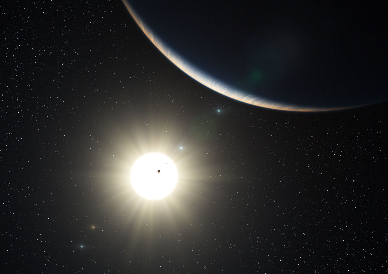תפיסת אמן מראה את המערכת הפלנטרית מסביב לכוכב דמוי השמש HD 10180. זכויות: ESO/L Calçada