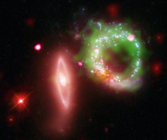 The composite image of ARP 147 contains X-ray information in pink, Hubble image in red, green and blue, as well as ultraviolet, GALEX satellite data in green and Spitzer data in red.