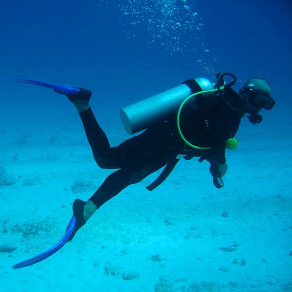 A diver using an open breathing system. From Wikipedia