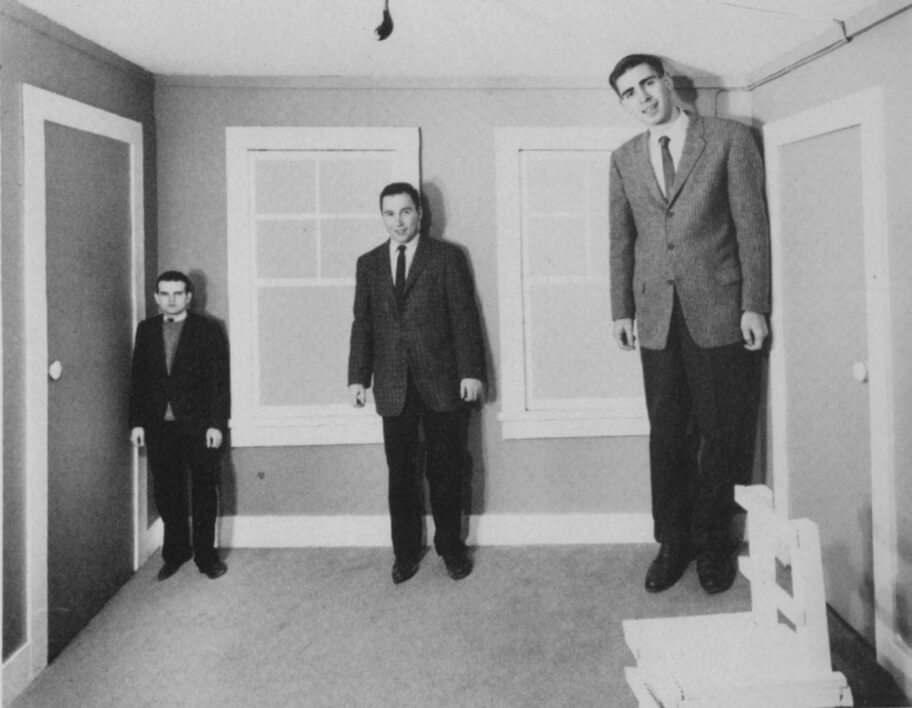 The Ames room - Adelbert Ames Jr. was invented in 1946 according to an idea conceived by Helmholtz. The three people are equal in size. The shape of the room is distorted. The source Wittereich, WJ (1959). Visual perception and personality, Scientific American, 200(4) ), 56-60. Photograph courtesy of William Vandivert.