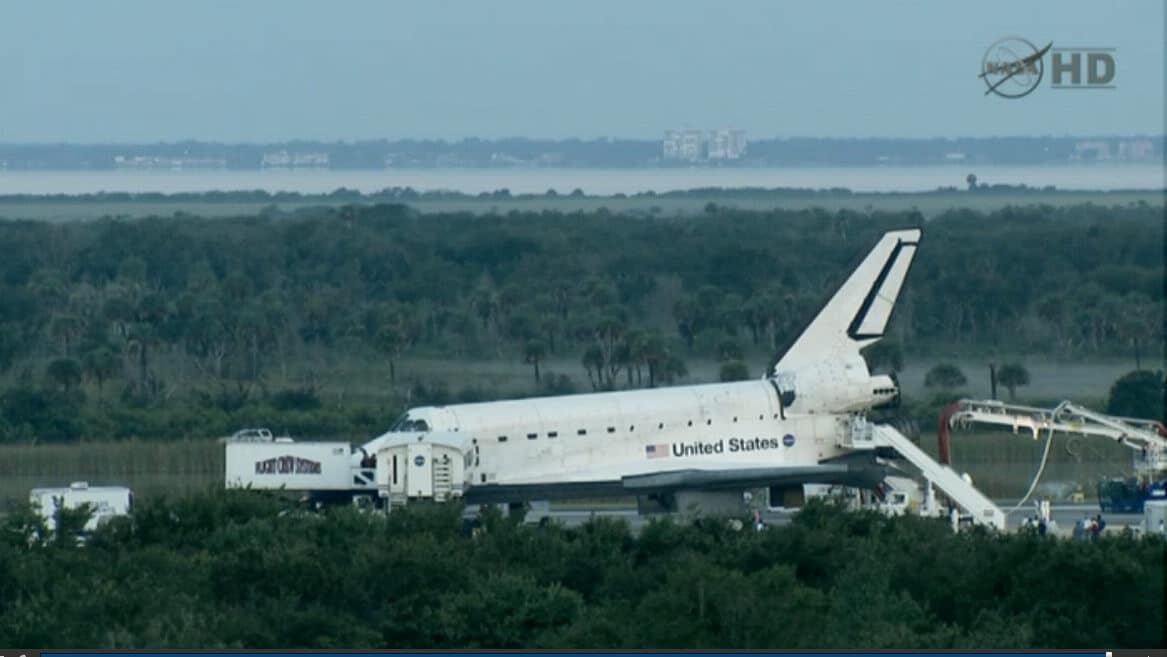 Atlantis being dismantled, about an hour after landing, July 21, 2011. From NASA TV