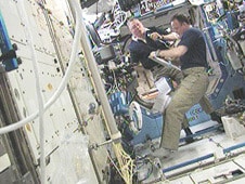 Mike Possum and Ron Garan aboard the space station a few days before Garan left with the members of the 28th landing crew. Photo: NASA TV