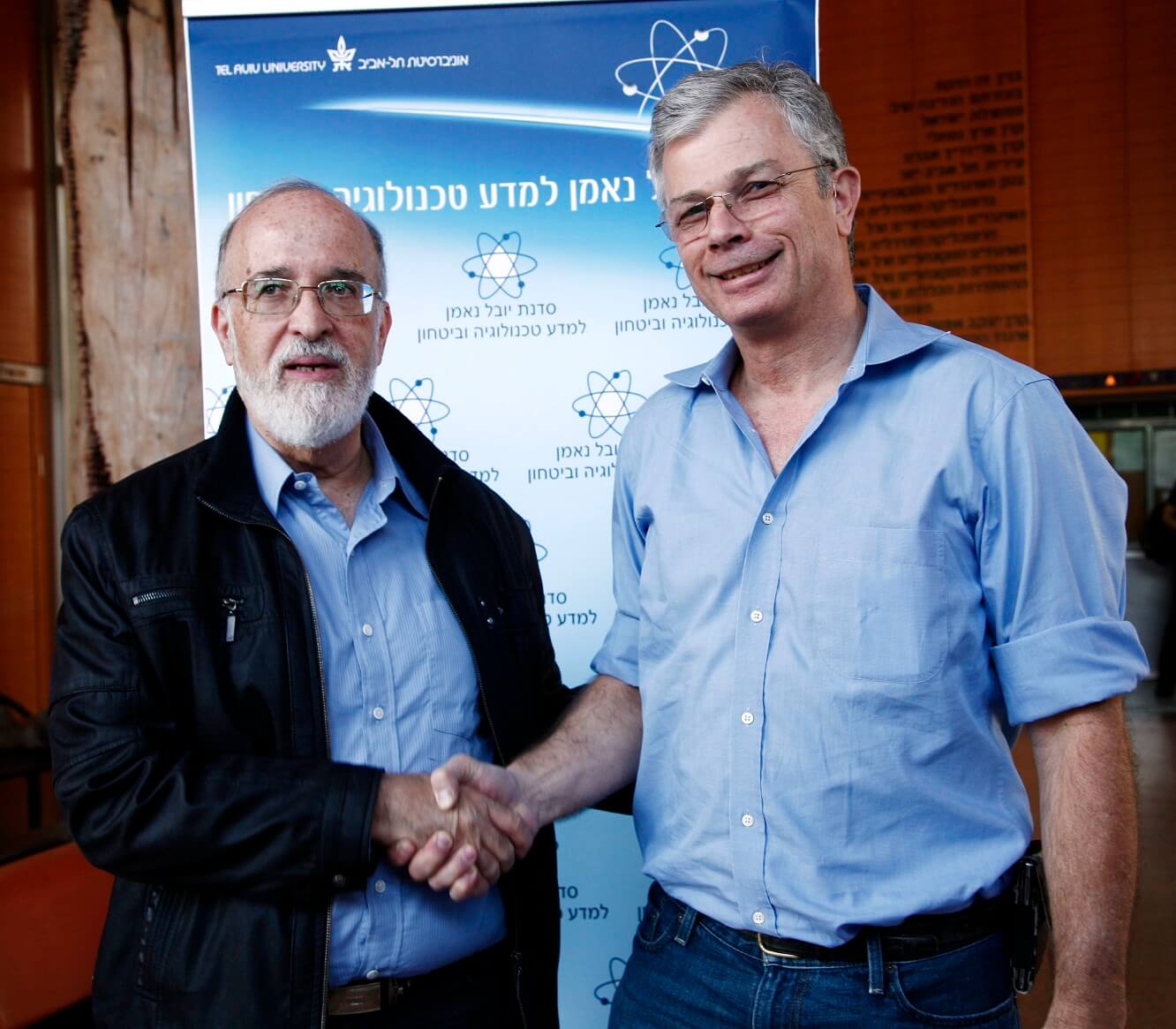 מימין: דדי פרלמוטר, סגן נשיא בכיר של חברת אינטל העולמית, ופרופ' יצחק בן ישראל