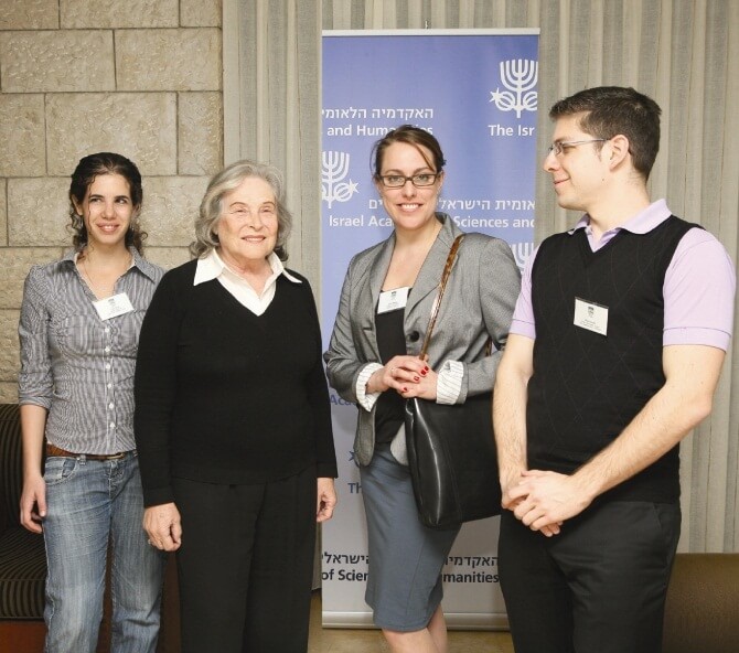 The president of the National Academy of Sciences Prof. Ruth Arnon and young volunteers who help bring scientists back to Israel. Photo: PR