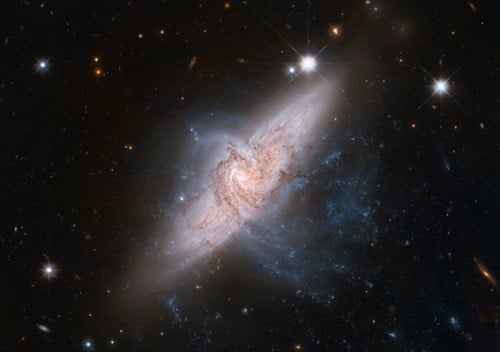 Galaxies pretending to collide. Photo: Hubble Space Telescope Heritage Center