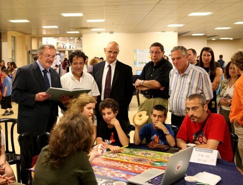In the photo (from left): Science Minister Prof. Daniel Hershkowitz, European Union Ambassador Andrew Standley and Haifa University President Prof. Aharon Ben-Zev talk with teenagers who came to the "Scientists' Night" events at the University of Haifa. Photo credit: Shay Levy