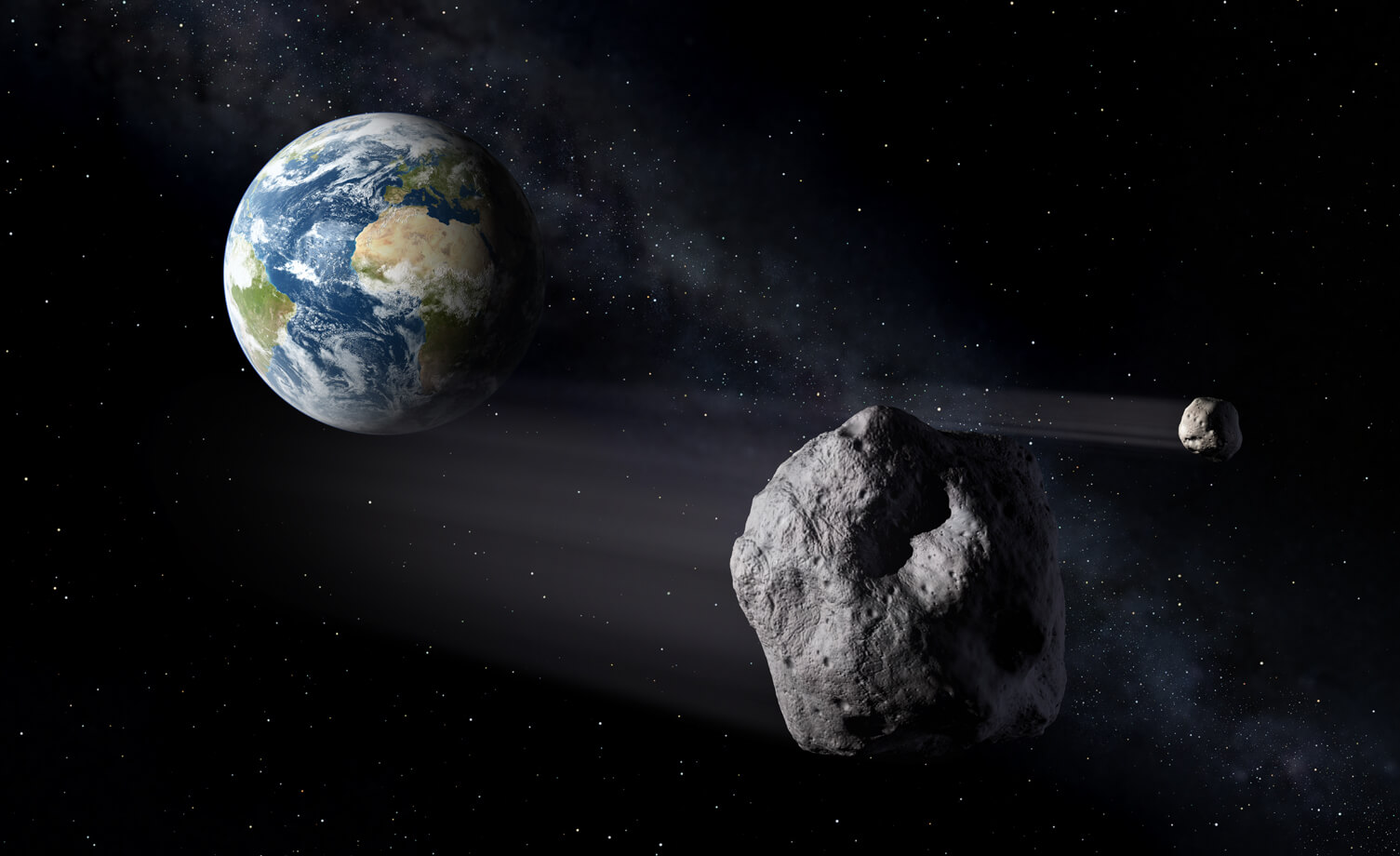אסטרואידים חולפים ליד כדור הארץ. איור: נאס"א