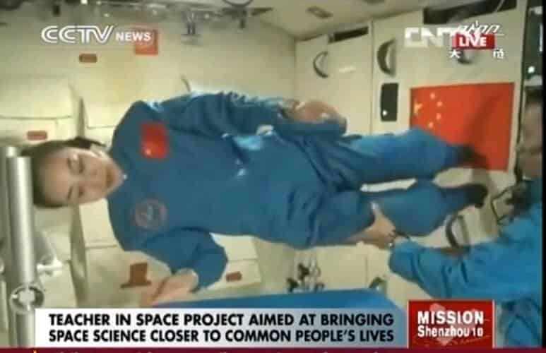 Chinese astronaut Wang Yaping, a teacher by profession, gives a lesson on the laws of physics in space from the Tiangong-1 space experiment station, June 2013 - Shenzhou-10 spacecraft crew member