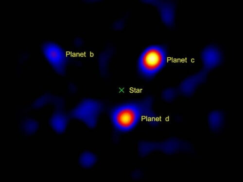 תצלום מערכת כוכבי הלכתHR8799 כפי שצולמה בידי הטלסקופ הייל. צילום: NASA/JPL-Caltech/Palomar Observatory.