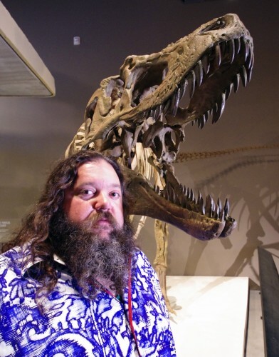 Dr. Mark Levin of the University of Utah next to the reconstruction of the dinosaur Lythronax argestes at the Museum of Natural History in Salt Lake City