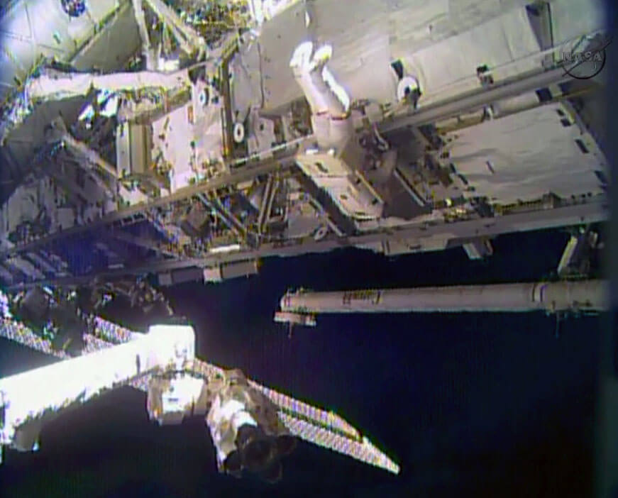Astronaut Rick Mastracchio works outside the International Space Station during the first of a series of spacewalks to replace a broken ammonia pump module. Photo: NASA TV