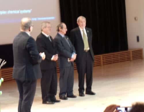 The 2013 Nobel Laureates in Chemistry in their Nobel Lecture, December 9, 2013. From the right: Martin Karpelos, Michael Levitt and Aryeh Warshel, and next to them is the moderator of the event on behalf of the Swedish Academy of Sciences. Photo: Avi Blizovsky