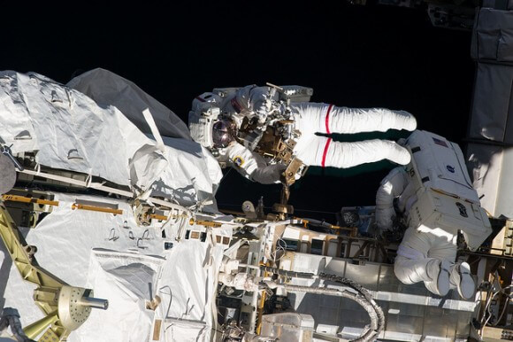 Crew 35 members Chris Cassidy (left) and Tom Meshburn on a May 11, 2013 spacewalk to scan and replace the suction control box on the space station. Photo: NASA.