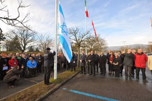 The Israeli flag is raised at CERN upon Israel's official accession to the organization. Photo: Foreign Ministry delegation in Geneva, Laurent Egli.