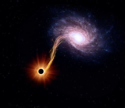 A spiral galaxy and a black hole. Illustration: shutterstock