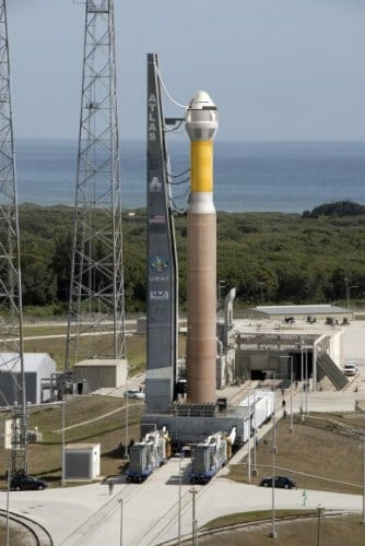 Boeing's CST-100 spacecraft awaits launch aboard the Atlas 5 launcher at the Kennedy Space Center. Artist illustration: Boeing.