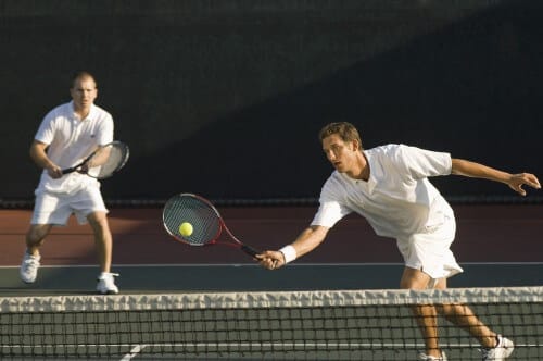 Tennis doubles match. Photo: shutterstock