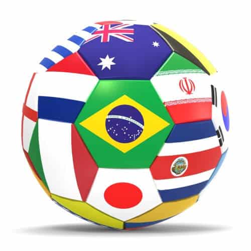 כדורגל המורכב מדגלי הנבחרות המשתתפות בטורניר גביע העולם בכדורגל 2014 המתקיים בברזיל. איור: shutterstock